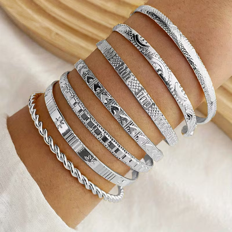7-teiliges goldfarbenes Armbandset – Offenes Armband aus einer Legierung im Bohemian- und Punk-Stil