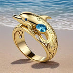 Delfinförmiger, vergoldeter Ring mit blauem synthetischem Zirkonia