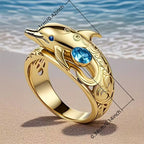 Delfinförmiger, vergoldeter Ring mit blauem synthetischem Zirkonia