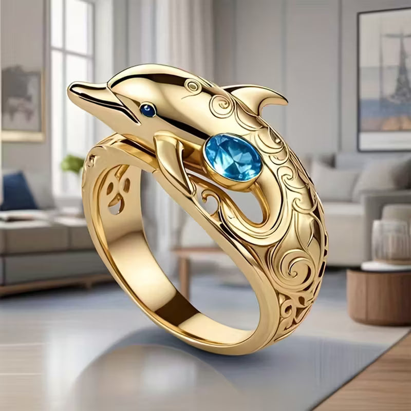 Delfinförmiger, vergoldeter Ring mit blauem synthetischem Zirkonia