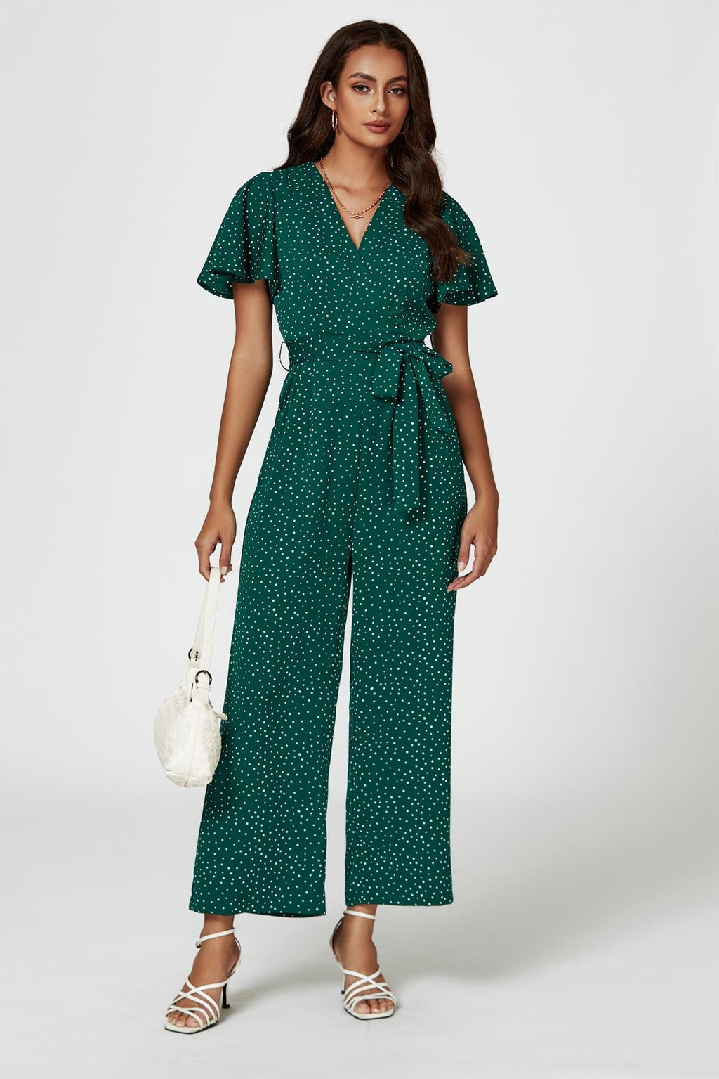 Gepunkteter Wickel-Jumpsuit in Grün