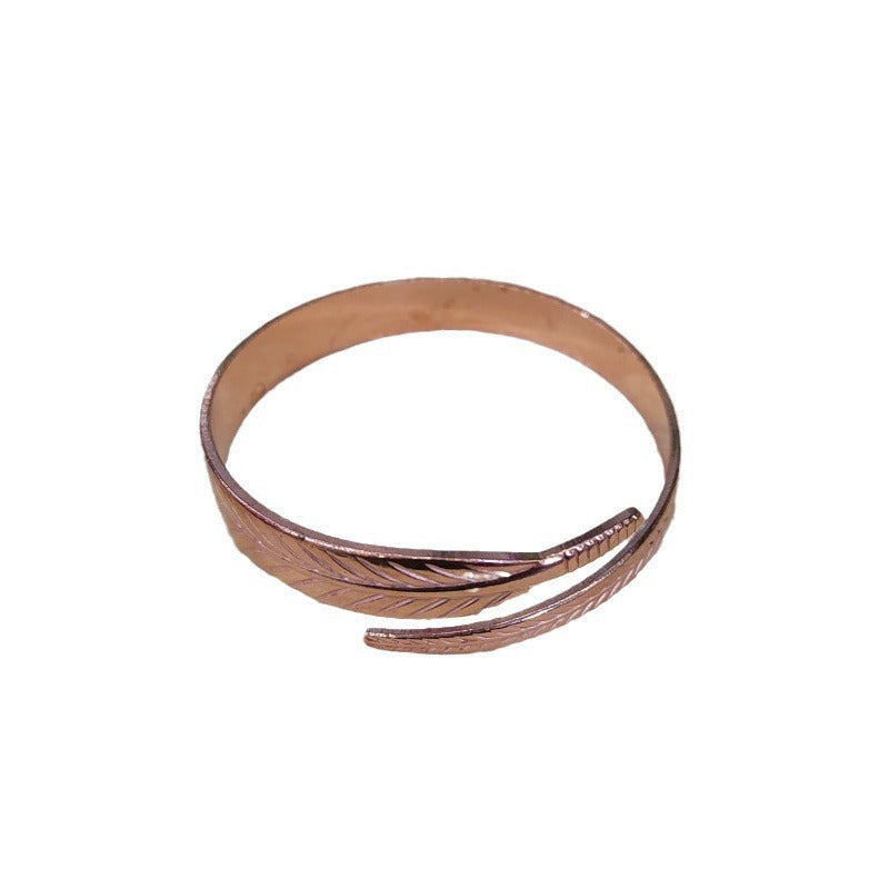 Bracelet rétro en cuivre avec motif de feuilles