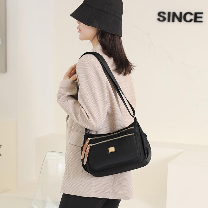 Sac à bandoulière léger et imperméable en tissu Oxford