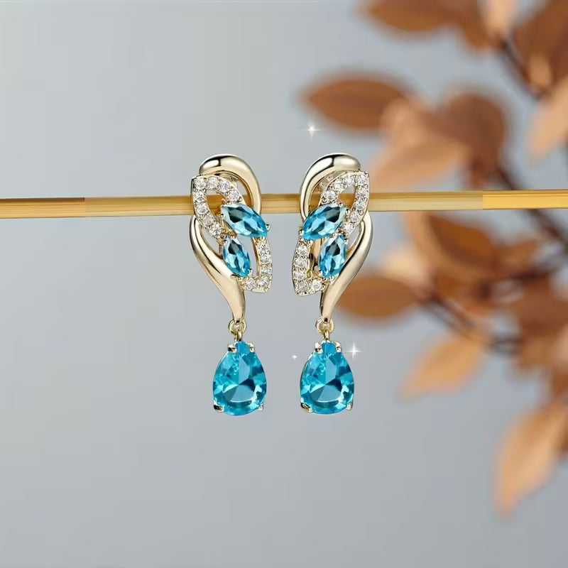 Elegante grüne Damen-Ohrringe in Tropfenform mit Zirkonia 