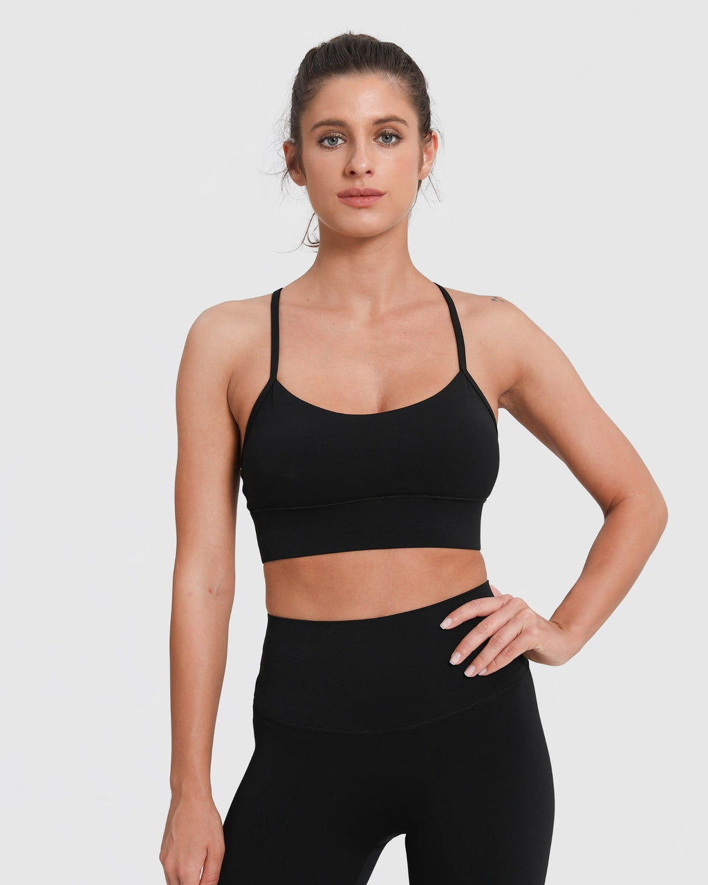 Sport-BH Racerback stützend mit herausnehmbaren Pads – Schwarz